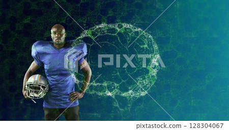 Image of digital brain spinning over male american football player holding helmet Image of digital brain spinning over male american football player holding helmet 128304067