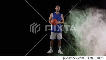 Image of colourful powders over basketball player 128304078