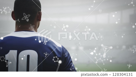 Image of chemical structures over male rugby players at stadium 128304131