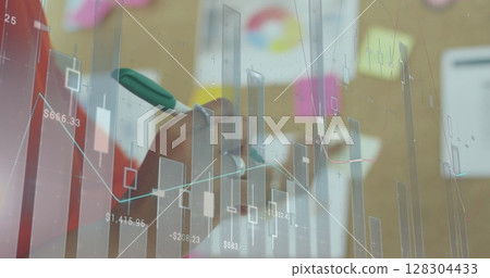Image of financial data processing over businesswoman taking notes 128304433