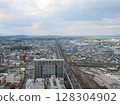 Aerial view of the railway line and streetscape through Fukushima city. A view of a regional city with the urban structure visible. 128304902