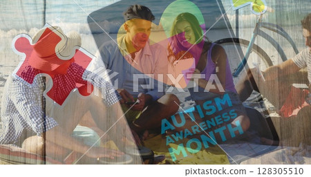 Image of autism awareness text and colorful puzzle pieces over happy people on the beach 128305510