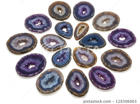 Colorful Amethyst and Agate Geode Slices Collection with Crystal Formations on White Background Colorful Amethyst and Agate Geode Slices Collection with Crystal Formations on White Background 128306063