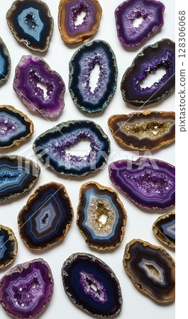 Colorful Amethyst and Agate Geode Slices Collection with Crystal Formations on White Background Colorful Amethyst and Agate Geode Slices Collection with Crystal Formations on White Background 128306068