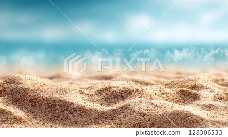 Beautiful summer background with sand and blue sky. Blurred beach scene with copy space 128306533