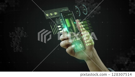Interacting with futuristic smartphone hologram, hand displaying digital data 128307514