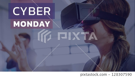 Woman using VR headset enjoying virtual reality experience on Cyber Monday 128307590