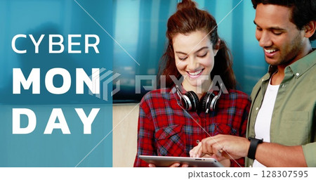 Smiling couple shopping online using tablet during Cyber Monday sale event Smiling couple shopping online using tablet during Cyber Monday sale event 128307595