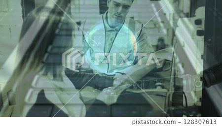 Warehouse worker in safety vest operating machinery, focusing on task at hand 128307613