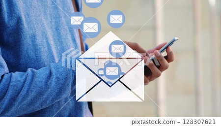 Person using smartphone for sending emails, focusing on communication technology 128307621