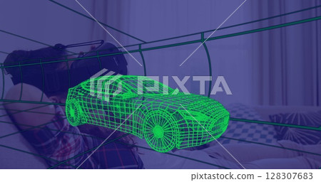 Image of 3d technical drawing of car, over woman at home wearing vr headset Image of 3d technical drawing of car, over woman at home wearing vr headset 128307683