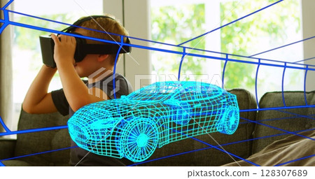 Image of 3d technical drawing of car, over boy at home wearing vr headset 128307689