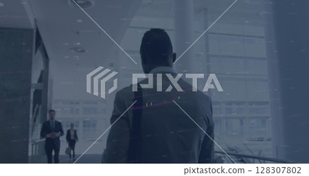 Image of cityscape over businessman working in office Image of cityscape over businessman working in office 128307802