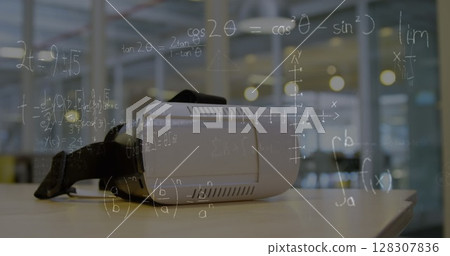 Image of mathematical equations over vr headsets 128307836