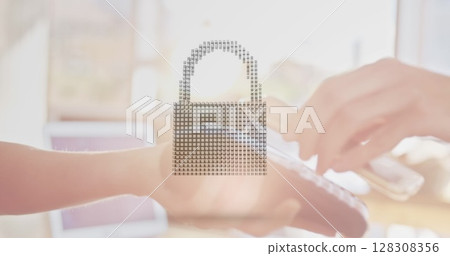 Image of network security padlock over people using payment terminal Image of network security padlock over people using payment terminal 128308356