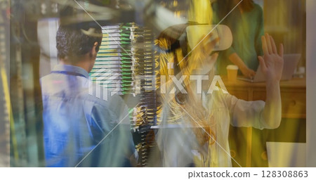 Virtual reality experience over people working with servers and computers in office 128308863