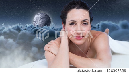 Relaxing woman over moon and clouds image 128308868