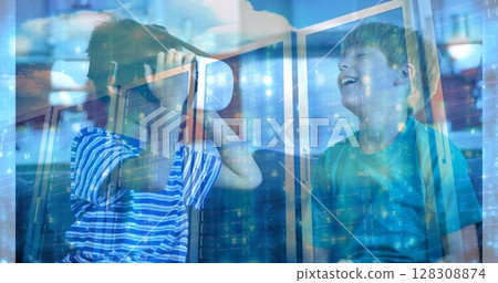 Digital composite of child using VR and laughing with a friend against animated background with serv Digital composite of child using VR and laughing with a friend against animated background with serv 128308874