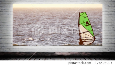 Digital composite of man wind surfing canvas mock up against animated grey brick wall Digital composite of man wind surfing canvas mock up against animated grey brick wall 128308903