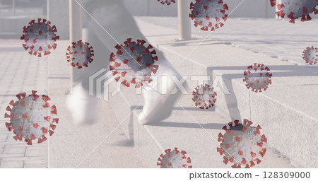 Coronavirus graphics overlaying scene as person walking up steps outdoors Coronavirus graphics overlaying scene as person walking up steps outdoors 128309000
