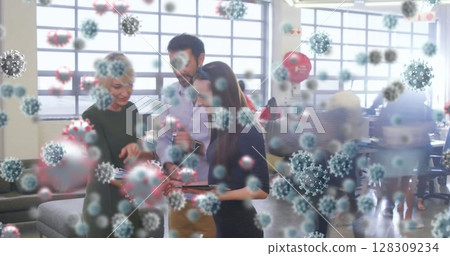 Image of covid 19 cells over people working in busy office 128309234