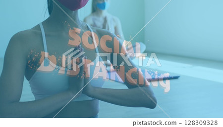 Image of multiple words flashing over caucasian women wearing face mask meditating Image of multiple words flashing over caucasian women wearing face mask meditating 128309328