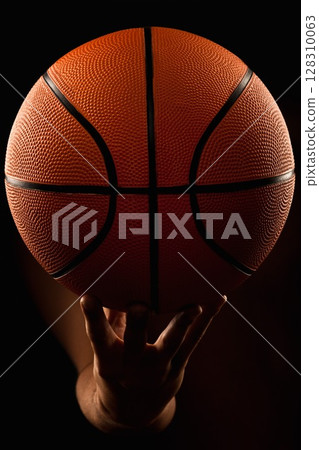 Basketball ball in male hands 128310063