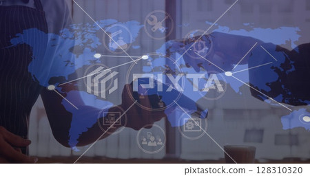 Digital icons over world map against person using smartphone to make payment 128310320
