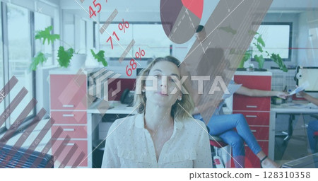 Image of statistics and charts with businesswoman and colleagues working in office 128310358