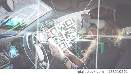Qr code scanner against woman wearing vr headset using digital tablet in self driving car Qr code scanner against woman wearing vr headset using digital tablet in self driving car 128310361
