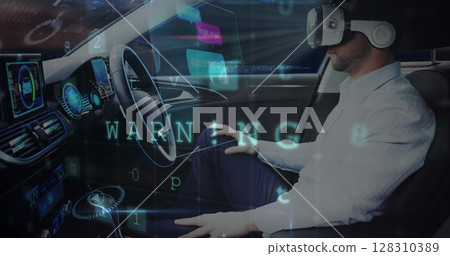 Image of information displays with man in vr headset using self driving car 128310389