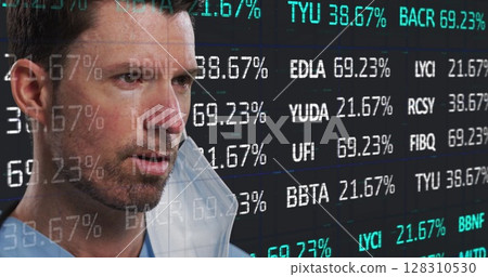 Image of financial data recording over male doctor with face mask Image of financial data recording over male doctor with face mask 128310530