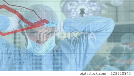 Financial data processing against caucasian male surgeon wearing face mask 128310543