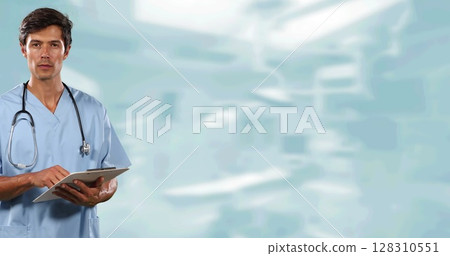 Portrait of caucasian male surgeon writing on clipboard and smiling against hospital in background Portrait of caucasian male surgeon writing on clipboard and smiling against hospital in background 128310551