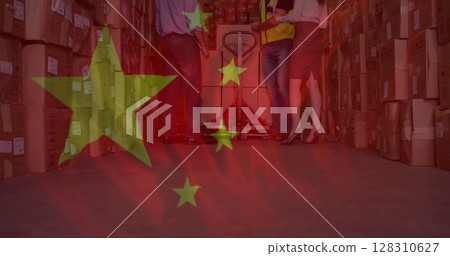 Image of chinese flag flowing over people working in warehouse 128310627