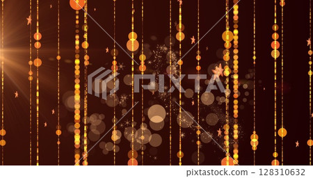 Image of multiple white stars falling with yellow glowing light trails 128310632