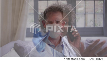 Image of male doctor holding test tube over senior woman talking on smartphone Image of male doctor holding test tube over senior woman talking on smartphone 128310699