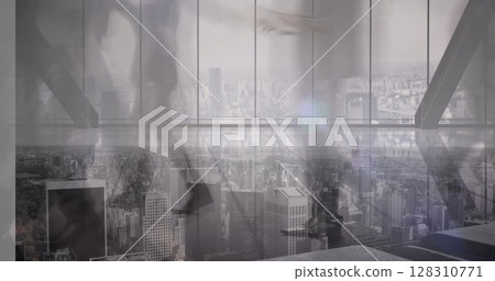 Image of business people walking in fast pace over cityscape 128310771