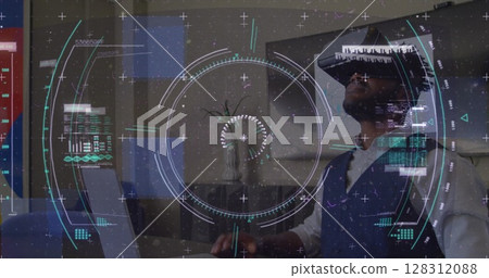 Data processing and scope scanning over african american man gesturing while wearing vr headset 128312088