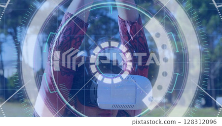 Light trails over neon scope scanner against caucasian woman wearing vr headset practicing yoga Light trails over neon scope scanner against caucasian woman wearing vr headset practicing yoga 128312096