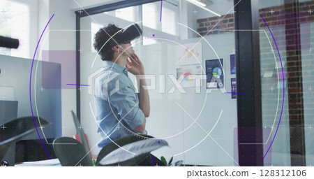 Image of purple light trails with hexagons over businessman wearing vr headset in office Image of purple light trails with hexagons over businessman wearing vr headset in office 128312106