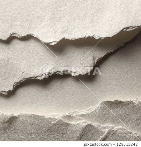 Abstract composition of torn paper, featuring textured edges and soft shadows. 128313248