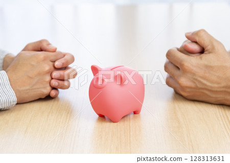 Men and women discussing money Men and women discussing money 128313631
