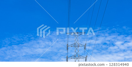 Blue sky, tower and power transmission line Blue sky, tower and power transmission line 128314940