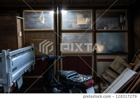 A cluttered workspace in a Tokyo back alley A cluttered workspace in a Tokyo back alley 128317279