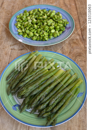 Fresh Steamed Green Asparagus on Plate  128318063