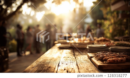 Outdoor gathering with friends enjoying a barbecue party, featuring a wooden table laden with grilled food, 128318277