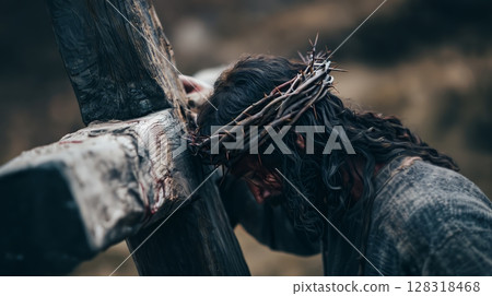 Dramatic portrayal of Jesus Christ on the cross reflects deep suffering during Easter celebration Dramatic portrayal of Jesus Christ on the cross reflects deep suffering during Easter celebration 128318468