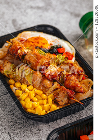 Grilled chicken skewers with corn noodles and egg 128320006