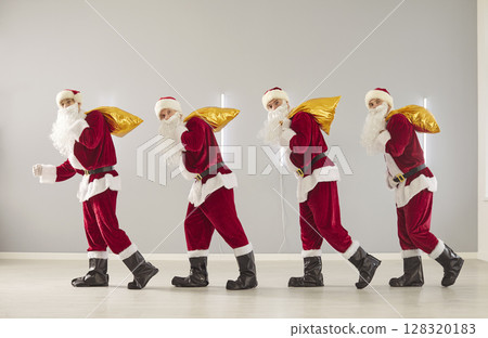 Happy New Year Santa Claus cute group carrying sacks, presenting gift box, partying fun Happy New Year Santa Claus cute group carrying sacks, presenting gift box, partying fun 128320183